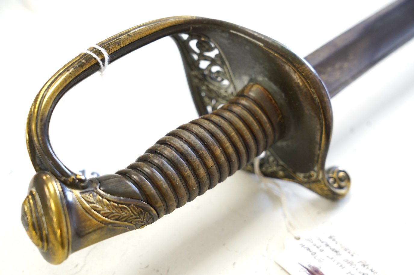 A mid 19th century French infantry officer’s sword with horn grip, blade 76cm. Condition - good, some age wear